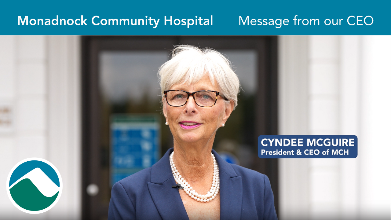 Video thumbnail featuring Cyndee McGuire, President & CEO of Monadnock Community Hospital, standing in front of the hospital entrance. The image includes the text 'Monadnock Community Hospital Message from our CEO' at the top, with her name and title 'Cyndee McGuire President & CEO of MCH' on the bottom right. The hospital logo is visible in the lower-left corner.