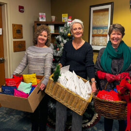 Pictured from left to right: Denise Chatel, Ellen Smith, and Ruth Clark smile bright as they donate gift bags for Oncology patients Pictured from left to right: Denise Chatel, Ellen Smith, and Ruth Clark smile bright as they donate gift bags for Oncology patients