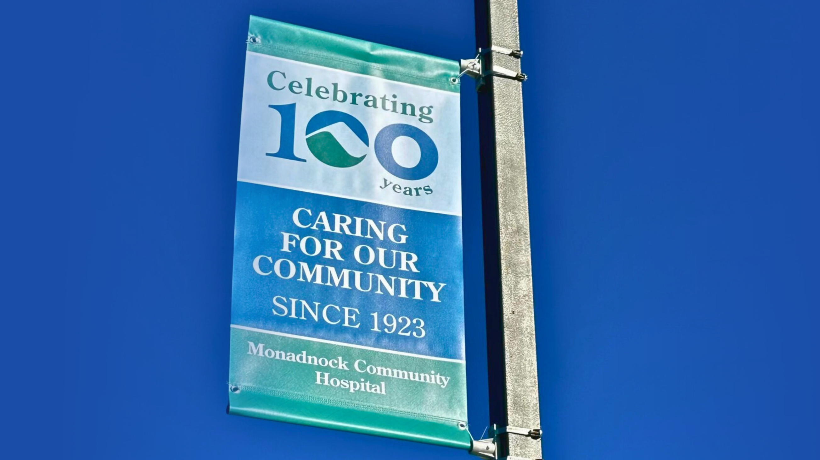 Banner for 100th anniversary celebrating a century of care