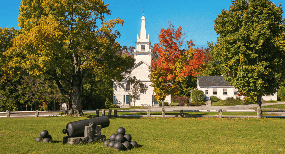 Scenic view of Temple with rolling hills and a clear sky, showcasing the peaceful rural landscape