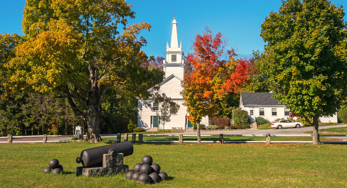 Scenic view of Temple with rolling hills and a clear sky, showcasing the peaceful rural landscape