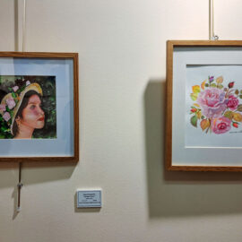 Two framed watercolor paintings displayed side by side. The left shows a woman in a floral hat against a green background, while the right depicts a bouquet of pink roses with green leaves, each piece highlighting delicate details and vibrant colors