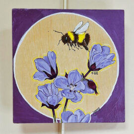 A painting by Kiera Burak titled 'Bee and Flowers,' depicting a bumblebee hovering over a cluster of purple flowers. The artwork is framed with a purple border and features a circular background, highlighting the natural beauty of pollinators and blooms