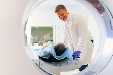 A technician operating an advanced diagnostic imaging machine, emphasizing diagnostic imaging services at Monadnock Community Hospital