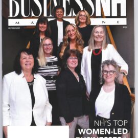 Cover of Business NH Magazine, October 2024 edition, featuring NH’s top women-led businesses and nonprofits. The cover shows a group of nine women standing on a staircase, dressed in business attire, with the title 'NH’s Top Women-Led Businesses & Nonprofits' at the bottom. The magazine celebrates its 40th anniversary, as indicated by a gold logo in the top right corner