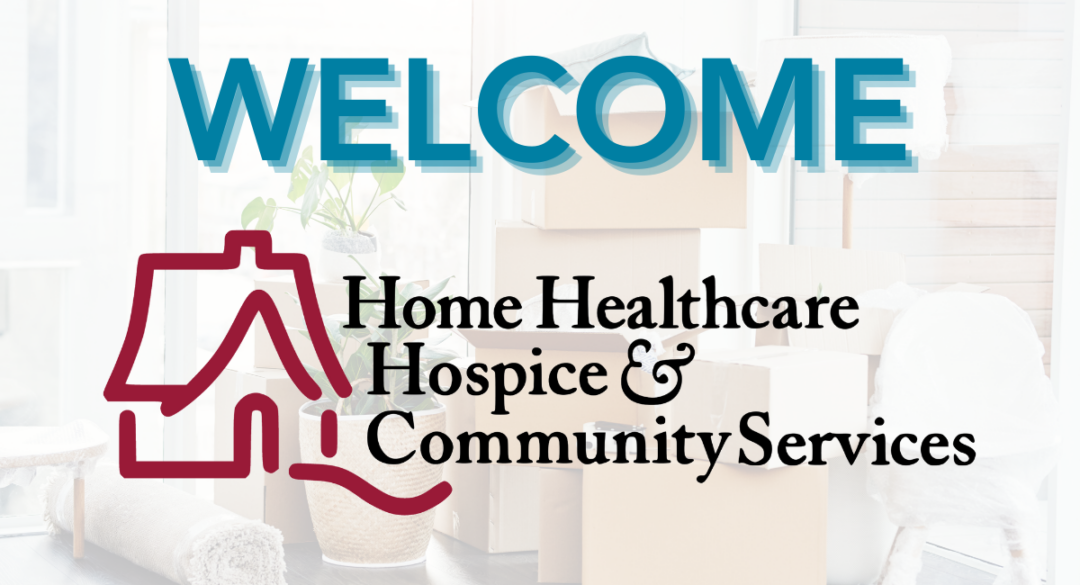 A welcoming graphic featuring the text 'WELCOME' in bold blue letters above the logo for Home Healthcare, Hospice & Community Services, with a background of moving boxes and plants in a bright, sunlit room