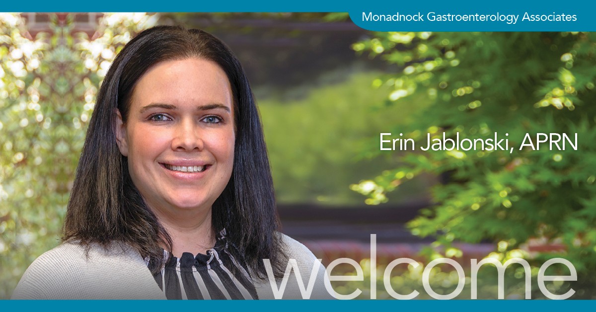 Portrait of Erin Jablonski, APRN, smiling in a warmly lit hallway with a brick accent wall. A blue banner at the top displays the text 'Welcome Erin Jablonski, APRN,' and the Monadnock Gastroenterology Associates logo is positioned in the lower right corner