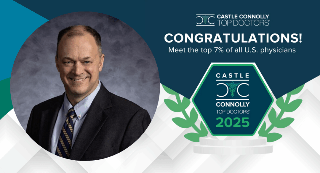 Portrait of Dr. Michael Gilbert in a suit, with a congratulatory banner for being named a 2025 Castle Connolly Top Doctor, recognizing him among the top 7% of U.S. physicians
