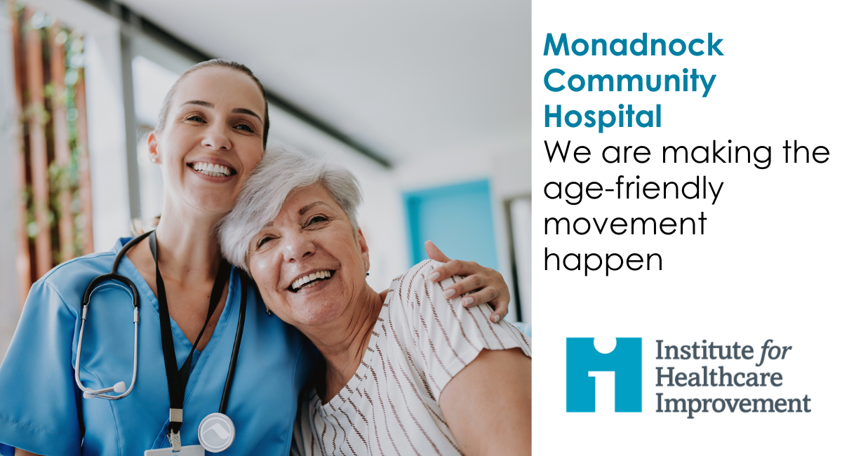 A smiling older adult woman embraces a cheerful nurse in blue scrubs, highlighting compassionate, age-friendly care.