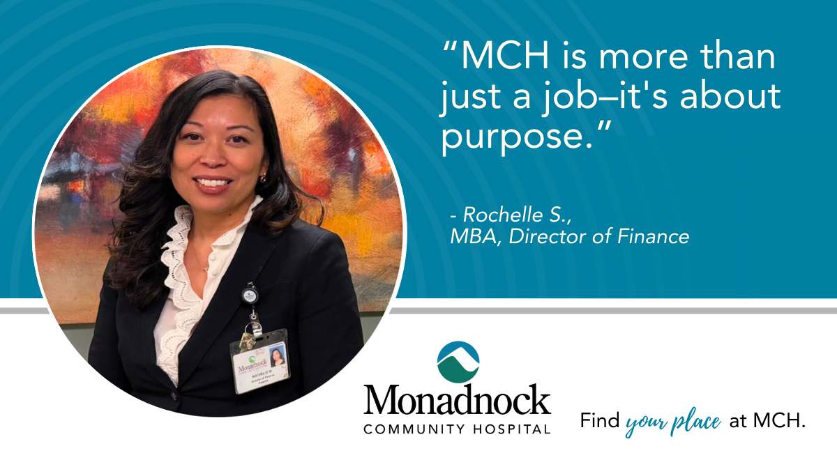 Photo of Rochelle S MBA Director of Finance wearing a black blazer and white blouse standing in front of colorful artwork with testimonial text about MCH being more than a job and about purpose at Monadnock Community Hospital
