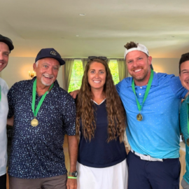 Winning Team Spaulding members wearing medals with Tournament Director LeeAnn Moore at the 2026 MCH Fall Foliage Golf Classic.